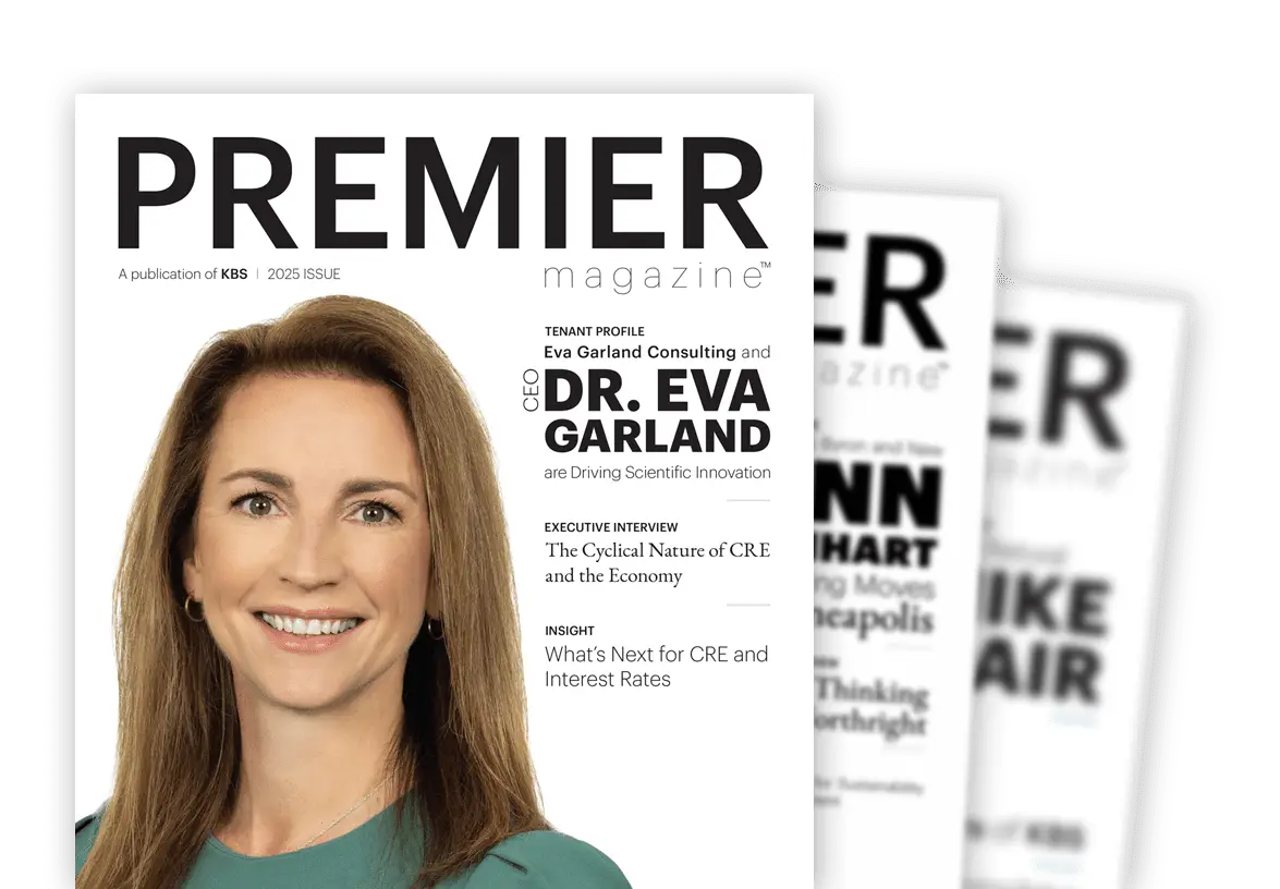 Cover of Premier magazine featuring a smiling portrait of Dr. Eva Garland, CEO of Eva Garland Consulting.